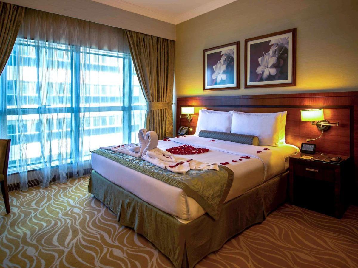 Grand Mercure Majlis Residences Αμπού Ντάμπι Εξωτερικό φωτογραφία A bedroom at the hotel